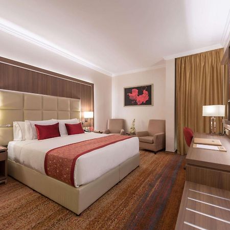 Hotel Ramada By Wyndham Continental Yidda Exterior foto