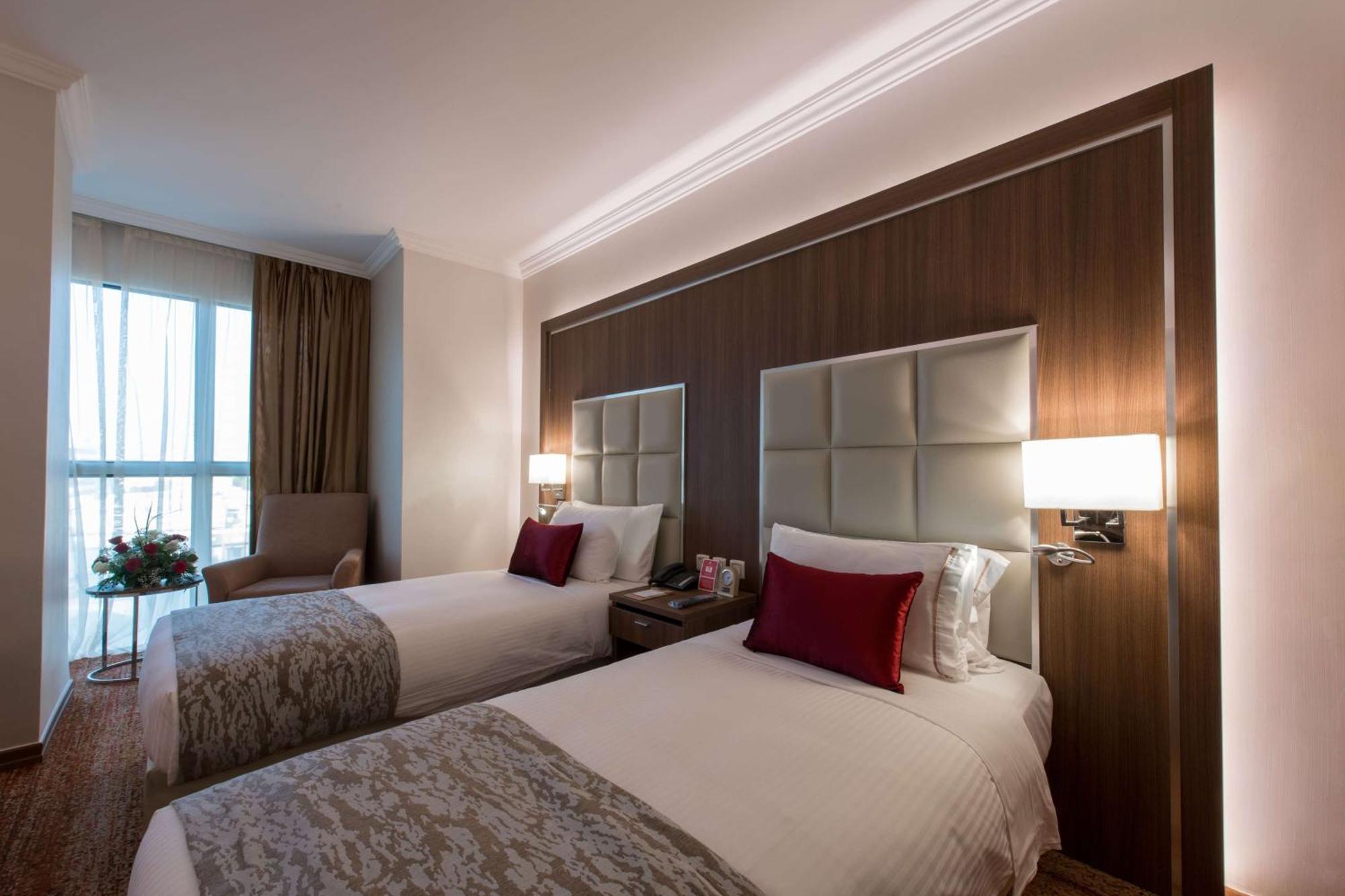 Hotel Ramada By Wyndham Continental Yidda Exterior foto